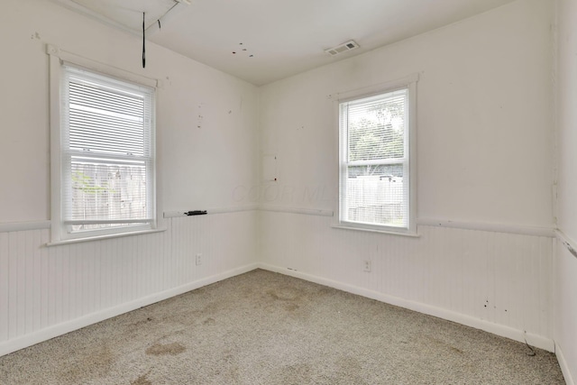 846 4th St, Lancaster, OH 43130 - carpeted empty room with wainscoting