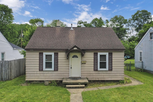 846 4th St, Lancaster, OH 43130 - view of front facade with roof with shingles and a chimney