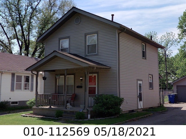85 Landers Ave, Columbus, OH 43207 - view of front facade with a porch and a garage