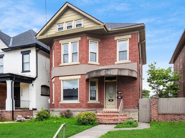 1360 S High St, Columbus, OH 43207 - view of front of property with brick siding and roof with shingles