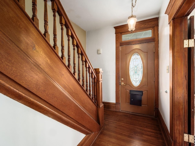 1360 S High St, Columbus, OH 43207 - foyer entrance featuring dark wood-style flooring and stairs