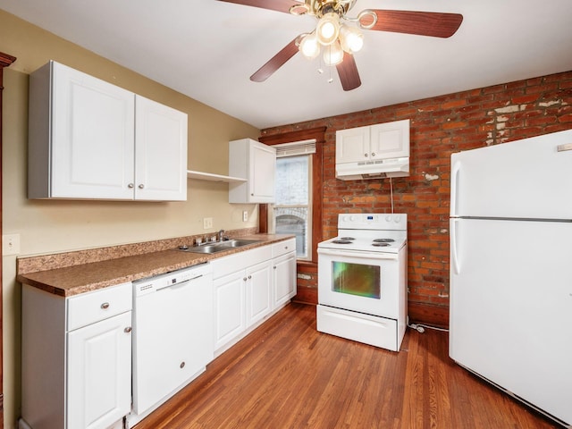 1360 S High St, Columbus, OH 43207 - kitchen featuring white appliances, under cabinet range hood, wood finished floors, ceiling fan, and white cabinetry