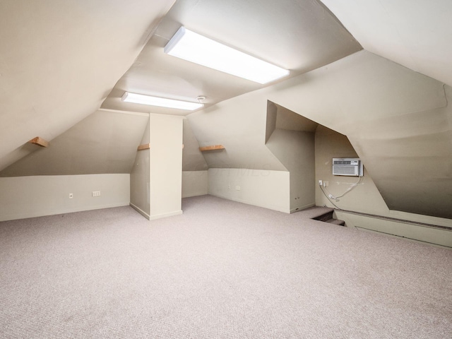 1360 S High St, Columbus, OH 43207 - additional living space featuring vaulted ceiling, carpet, and an AC wall unit