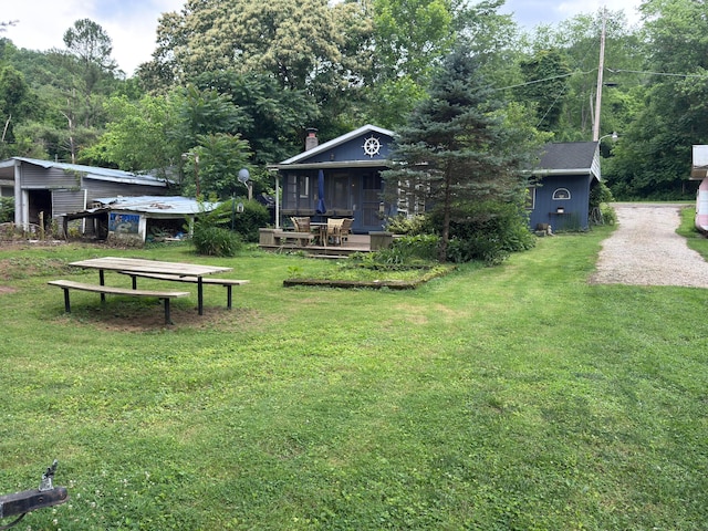 1470 S Riverview Rd, Malta, OH 43758 - view of grassy yard with gravel driveway