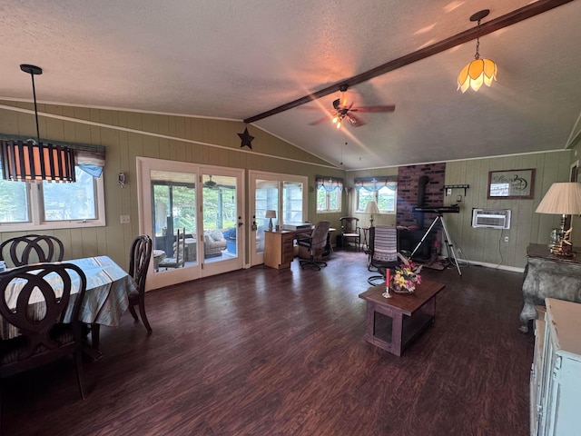 1470 S Riverview Rd, Malta, OH 43758 - living area with wood finished floors, a textured ceiling, wood walls, ceiling fan, and french doors