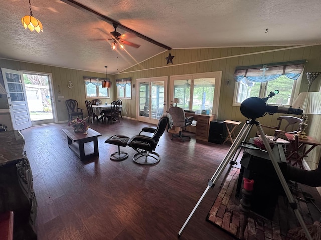 1470 S Riverview Rd, Malta, OH 43758 - living room featuring a textured ceiling, wood finished floors, plenty of natural light, ceiling fan, and vaulted ceiling