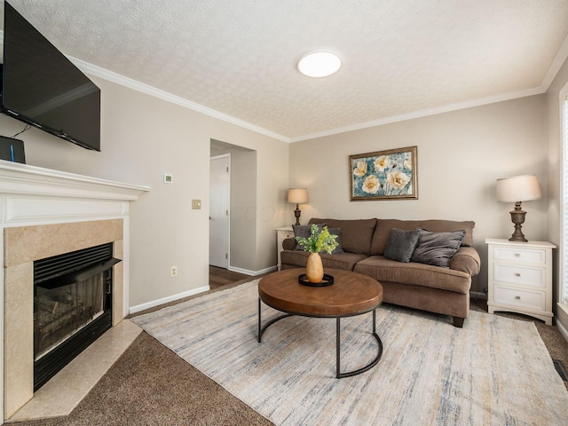 3538 Rosburg Dr, Columbus, OH 43228 - living area with a tile fireplace, crown molding, a textured ceiling, and carpet floors