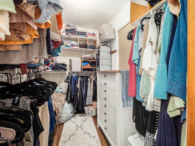 3538 Rosburg Dr, Columbus, OH 43228 - spacious closet featuring wood finished floors