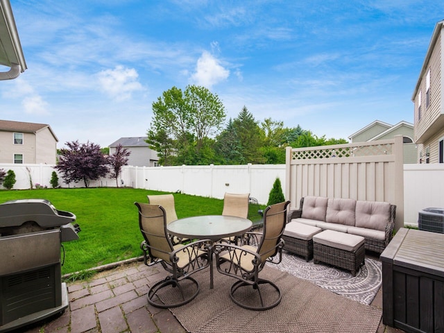3538 Rosburg Dr, Columbus, OH 43228 - fenced backyard with grilling area, a patio area, an outdoor hangout area, and outdoor dining area