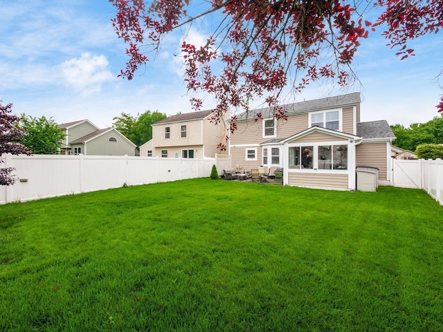 3538 Rosburg Dr, Columbus, OH 43228 - back of house featuring a fenced backyard and a sunroom