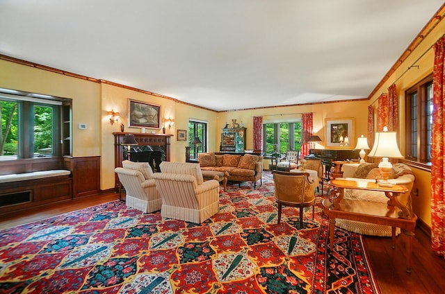 2475 Signal Hill Rd, Springfield, OH 45504 - living area with wood finished floors, a premium fireplace, and crown molding