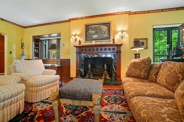 2475 Signal Hill Rd, Springfield, OH 45504 - living area featuring a premium fireplace, ornamental molding, and wood finished floors