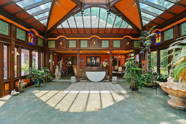 2475 Signal Hill Rd, Springfield, OH 45504 - sunroom / solarium featuring a skylight, lofted ceiling, and a chandelier