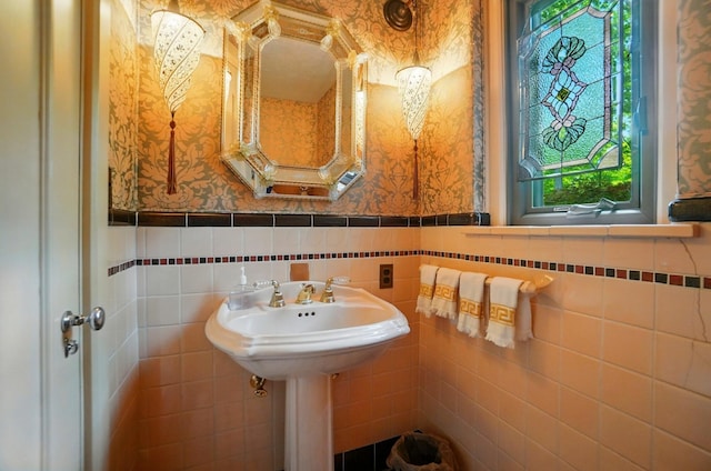 2475 Signal Hill Rd, Springfield, OH 45504 - bathroom featuring wallpapered walls, tile walls, and a wainscoted wall