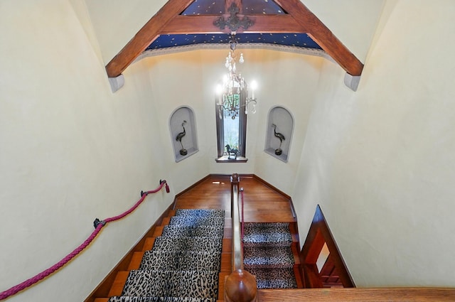 2475 Signal Hill Rd, Springfield, OH 45504 - stairs featuring a high ceiling and a chandelier