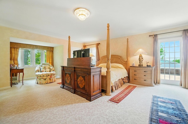 2475 Signal Hill Rd, Springfield, OH 45504 - bedroom with multiple windows, carpet, access to outside, and ornamental molding