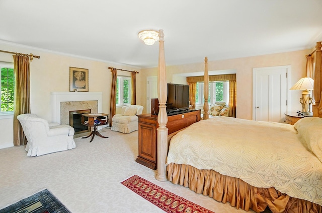 2475 Signal Hill Rd, Springfield, OH 45504 - bedroom with multiple windows, a premium fireplace, light colored carpet, and ornamental molding