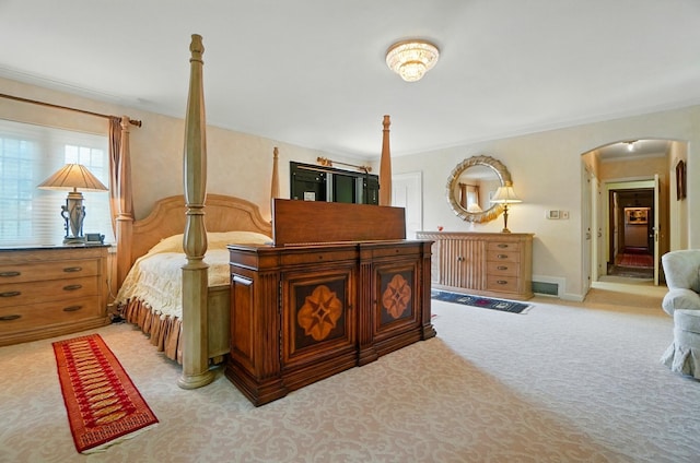 2475 Signal Hill Rd, Springfield, OH 45504 - bedroom with light colored carpet, arched walkways, and ornamental molding