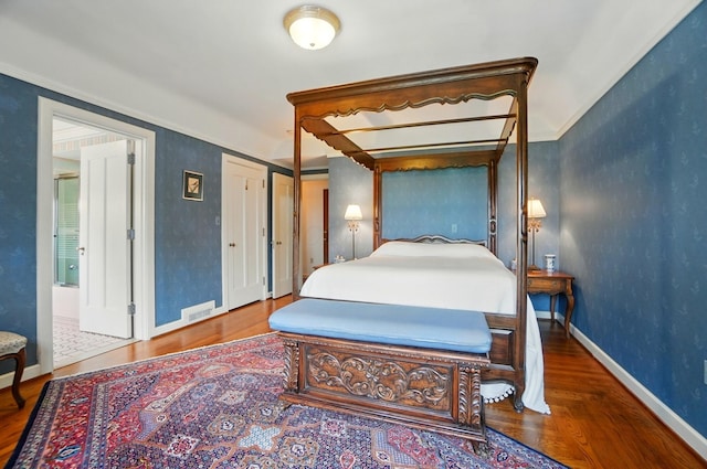 2475 Signal Hill Rd, Springfield, OH 45504 - bedroom featuring wood finished floors and crown molding