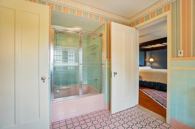 2475 Signal Hill Rd, Springfield, OH 45504 - full bath featuring ensuite bath, shower / bath combination with glass door, and wallpapered walls