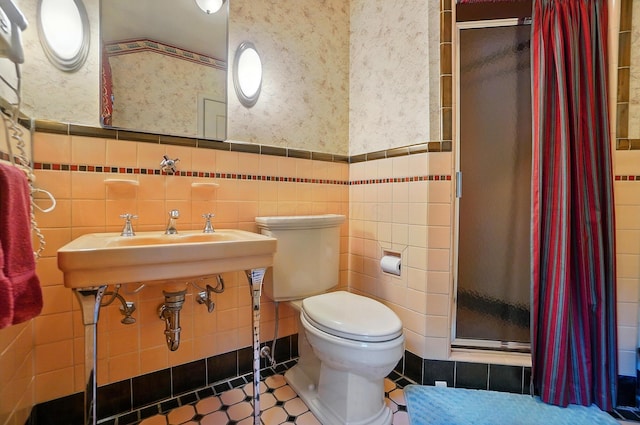 2475 Signal Hill Rd, Springfield, OH 45504 - full bathroom with tile walls, a shower stall, wallpapered walls, and wainscoting