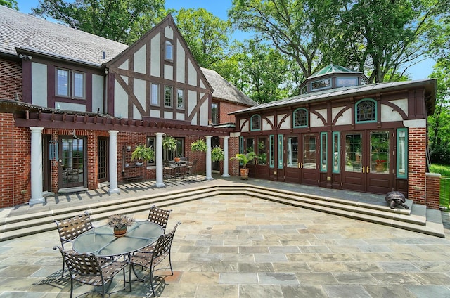2475 Signal Hill Rd, Springfield, OH 45504 - view of patio / terrace featuring french doors, outdoor dining area, and a pergola