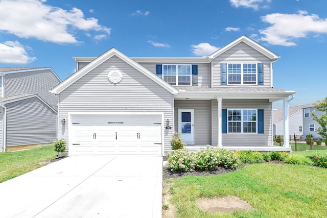 166 Rosewood Loop SE, Commercial Point, OH 43116 - traditional-style home with covered porch, driveway, a garage, and a front yard