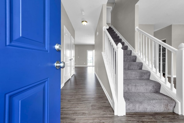 166 Rosewood Loop SE, Commercial Point, OH 43116 - foyer entrance with stairway and dark wood finished floors