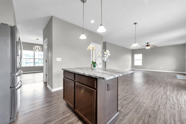 166 Rosewood Loop SE, Commercial Point, OH 43116 - kitchen featuring freestanding refrigerator, ceiling fan, dark wood-style floors, dark brown cabinetry, and hanging light fixtures