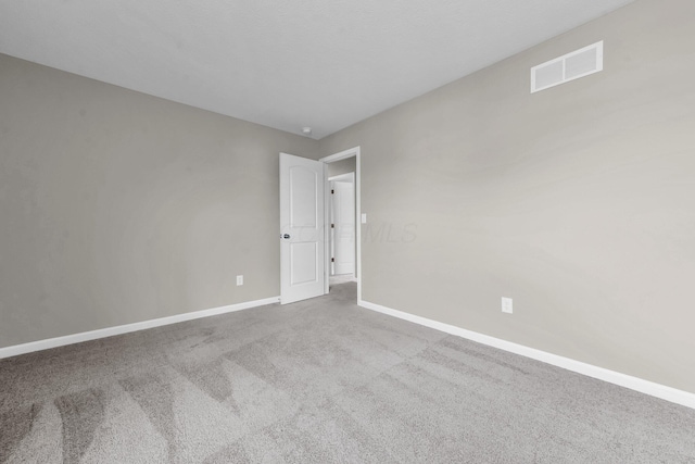 166 Rosewood Loop SE, Commercial Point, OH 43116 - carpeted empty room with baseboards