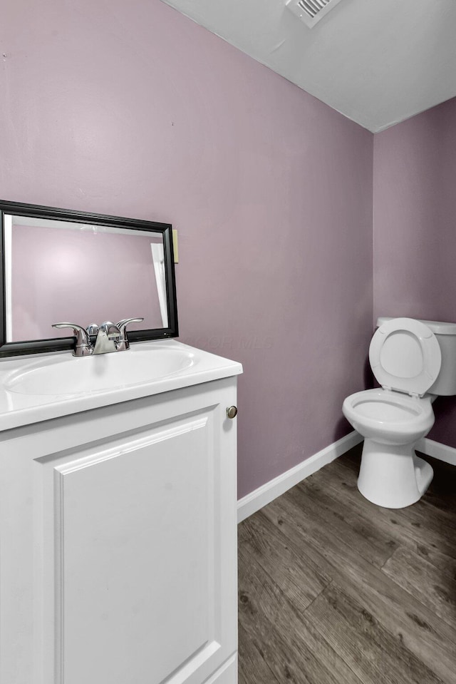 166 Rosewood Loop SE, Commercial Point, OH 43116 - half bath featuring wood finished floors and vanity