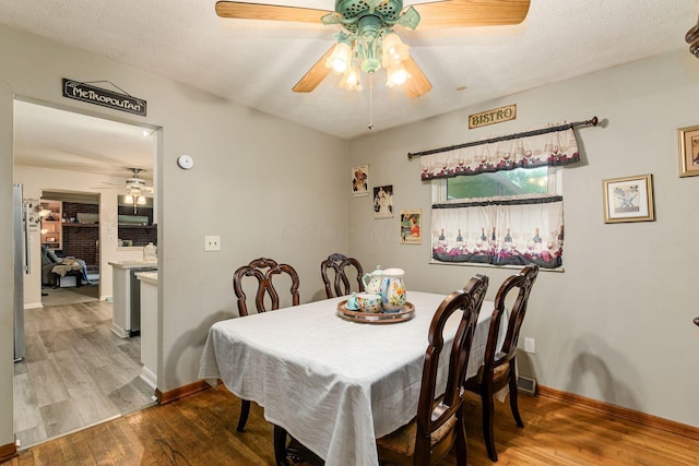 6103 Renner Rd, Columbus, OH 43228 - dining space with a ceiling fan and wood finished floors