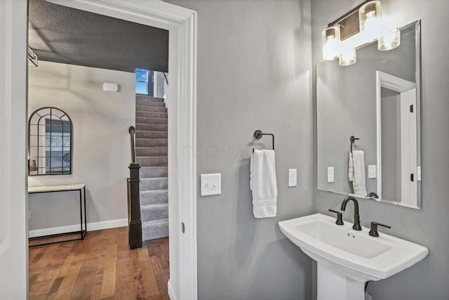 117 Sparrow Ct, Pickerington, OH 43147 - bathroom featuring wood finished floors and a sink