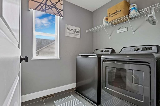 117 Sparrow Ct, Pickerington, OH 43147 - laundry room featuring washer and dryer and tile patterned floors