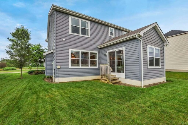117 Sparrow Ct, Pickerington, OH 43147 - rear view of house featuring a yard