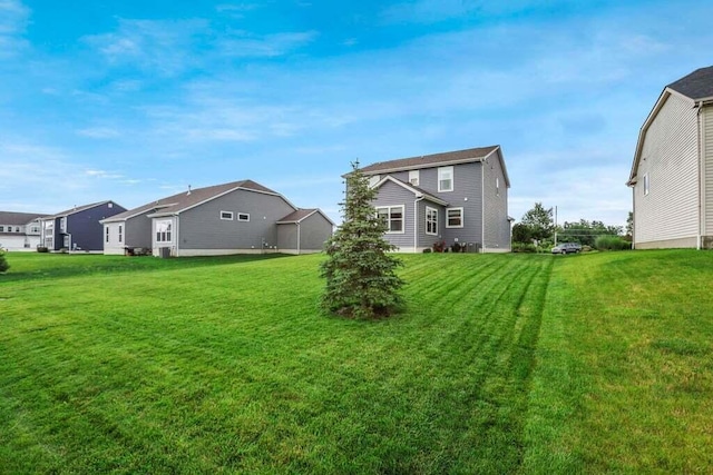 117 Sparrow Ct, Pickerington, OH 43147 - rear view of house with a yard and a residential view