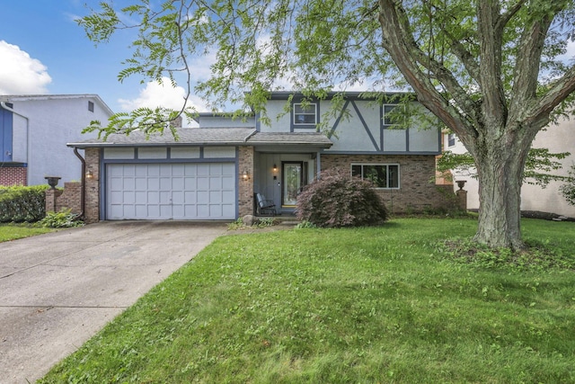 2809 Bella Via Ave, Columbus, OH 43231 - view of front of house with a garage, a front lawn, concrete driveway, brick siding, and stucco siding