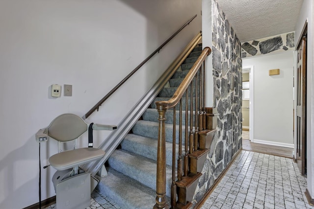 2809 Bella Via Ave, Columbus, OH 43231 - stairs with baseboards and a textured ceiling