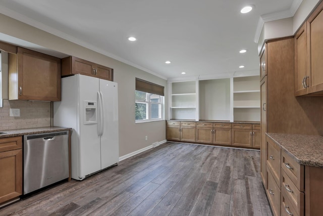 2809 Bella Via Ave, Columbus, OH 43231 - kitchen with dishwasher, white fridge with ice dispenser, dark wood finished floors, brown cabinetry, and ornamental molding