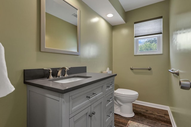 2809 Bella Via Ave, Columbus, OH 43231 - bathroom featuring vanity, wood finished floors, and recessed lighting