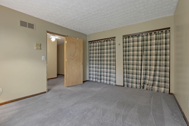 2809 Bella Via Ave, Columbus, OH 43231 - unfurnished bedroom featuring carpet flooring and a textured ceiling