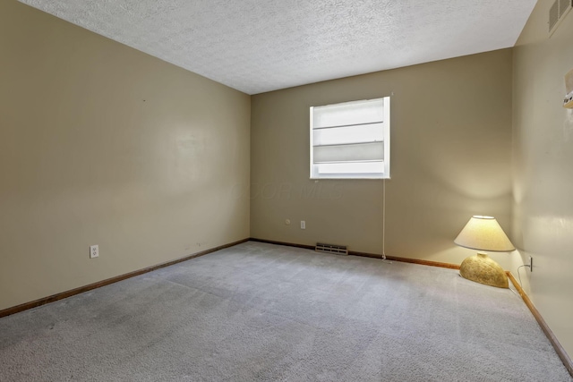 2809 Bella Via Ave, Columbus, OH 43231 - carpeted empty room featuring a textured ceiling