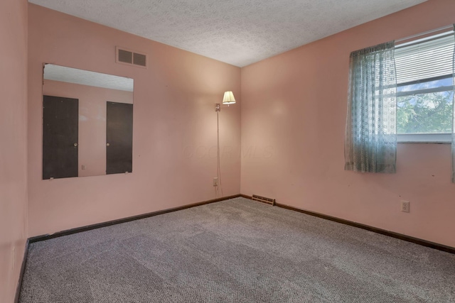 2809 Bella Via Ave, Columbus, OH 43231 - carpeted spare room with a textured ceiling and baseboards