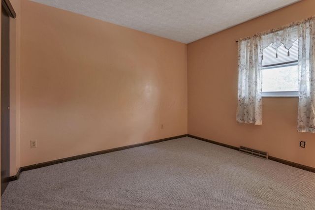 2809 Bella Via Ave, Columbus, OH 43231 - unfurnished room featuring carpet floors and a textured ceiling