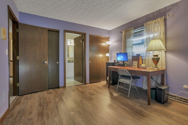2809 Bella Via Ave, Columbus, OH 43231 - office with wood finished floors and a textured ceiling