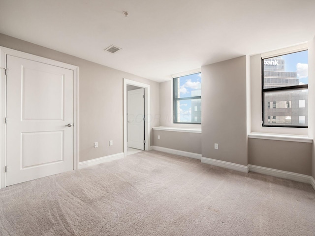 50 W Broad St Unit 2701, Columbus, OH 43215 - unfurnished bedroom with carpet floors and baseboards