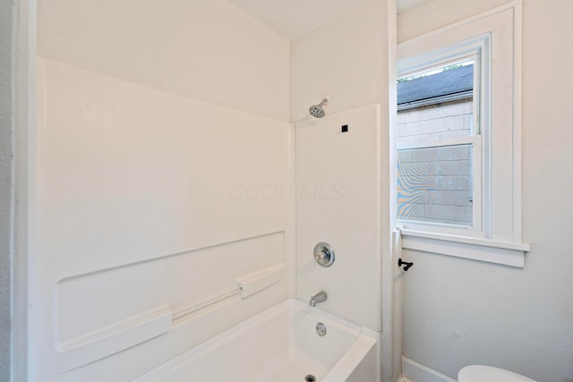 1430 Aberdeen Ave, Columbus, OH 43211 - bathroom featuring baseboards and shower / tub combination