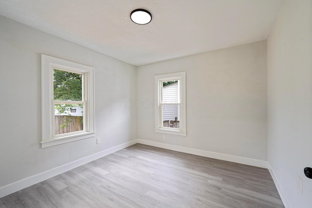 1430 Aberdeen Ave, Columbus, OH 43211 - spare room featuring healthy amount of natural light and light wood-style flooring