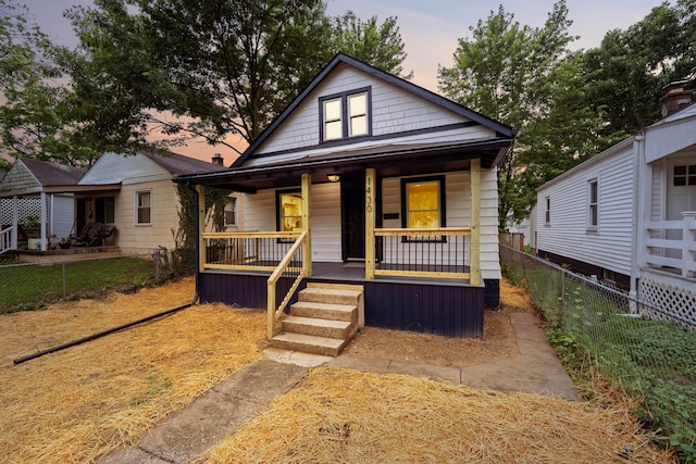 1430 Aberdeen Ave, Columbus, OH 43211 - bungalow-style house with covered porch and a fenced backyard