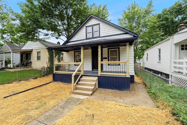1430 Aberdeen Ave, Columbus, OH 43211 - view of front facade featuring covered porch and a fenced backyard